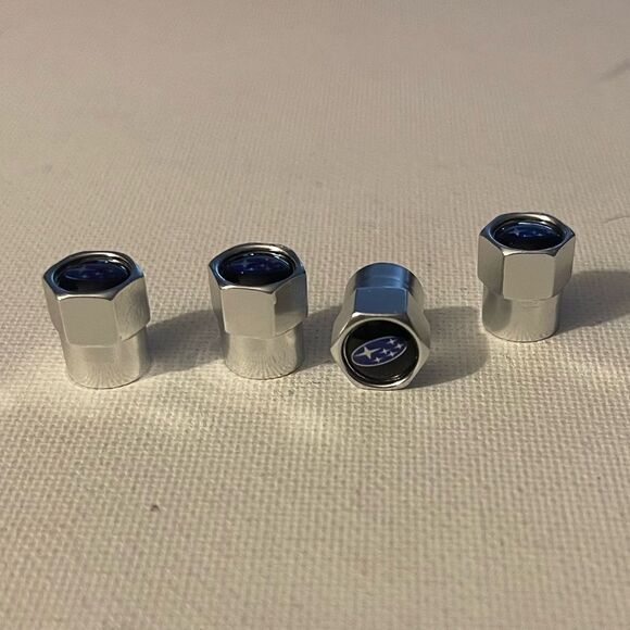 Subaru logo valve Stem caps in Silver set of 4 NWT - Picture 2 of 4